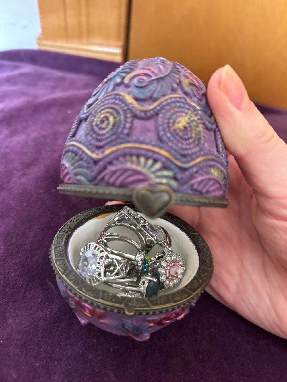 Purple jewelry box with mystery silver rings